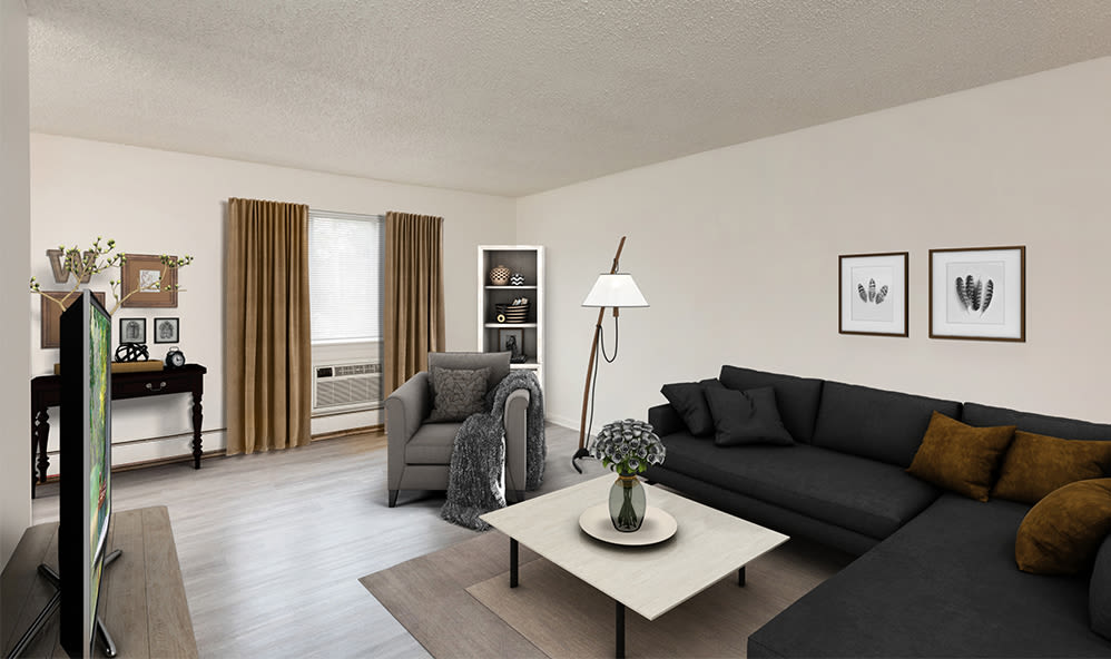 Spacious living room at Knollwood Manor Apartments in Fairport, New York