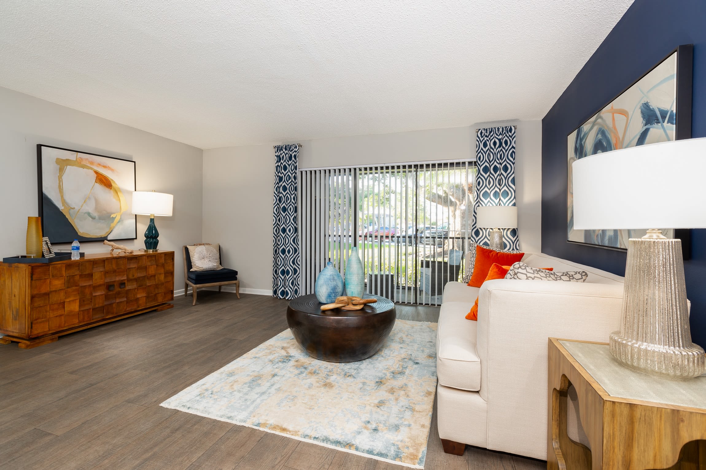 Spacious bedroom with ceiling fan in model home at Verse at Royal Palm Beach in Royal Palm Beach, Florida