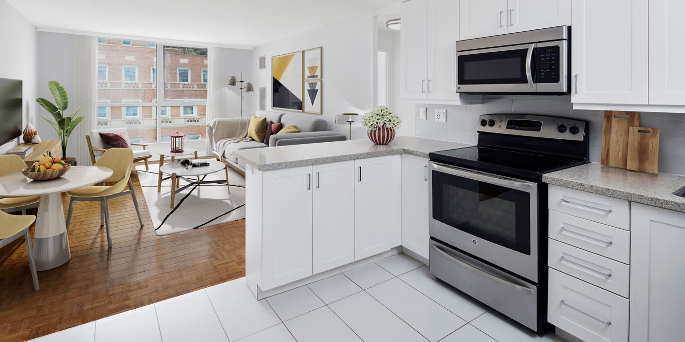 Enjoy a luxury kitchen with breakfast bar at Residences on Bloor