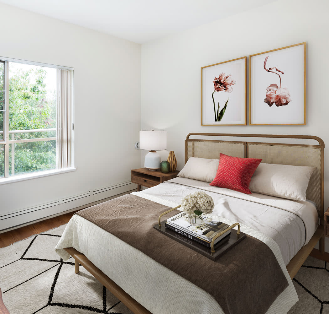 Beautiful bedroom at Dunway Court in Vancouver, British Columbia