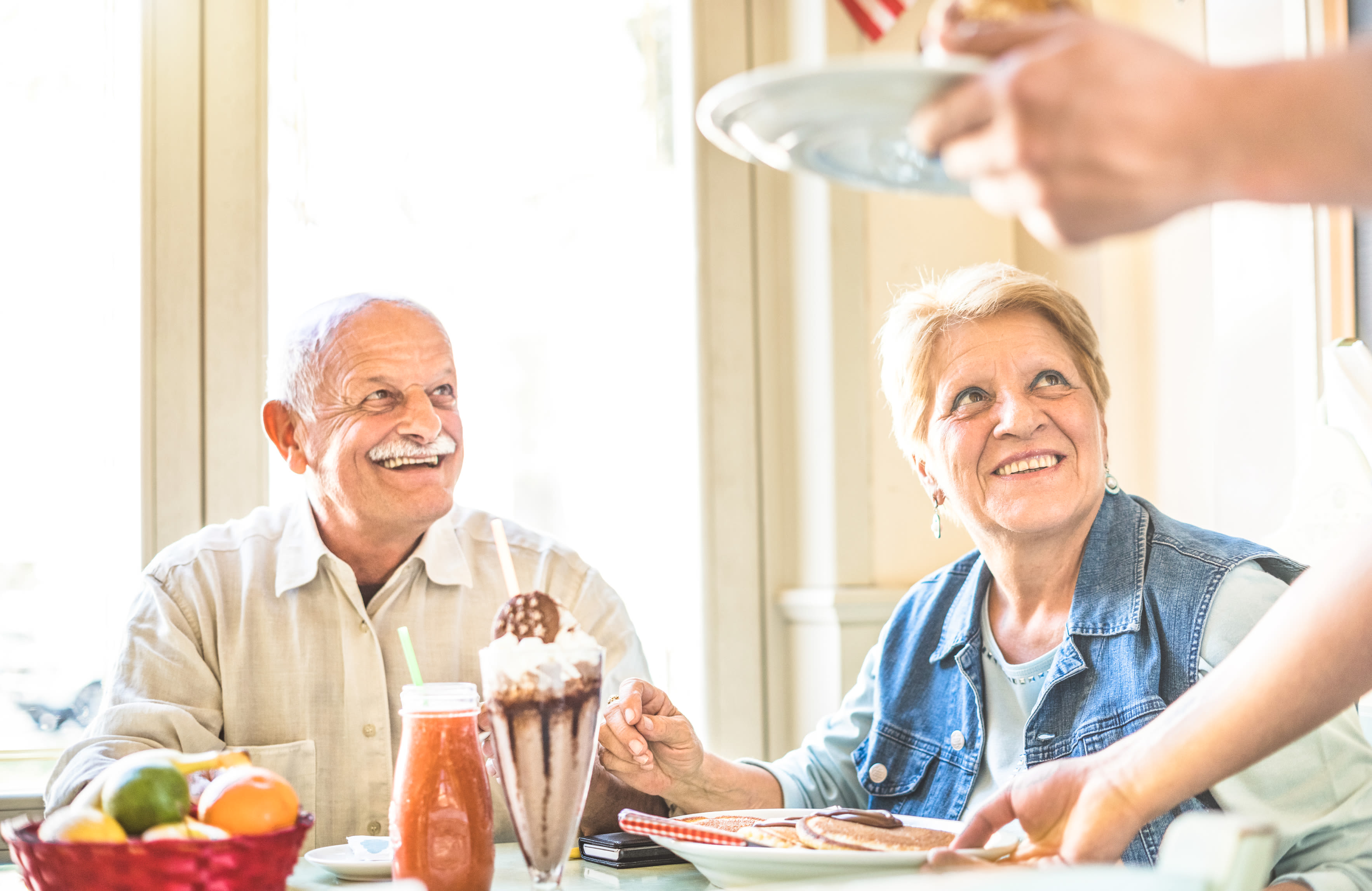 Senior couple having a meal at Almond Heights in Orangevale, California
