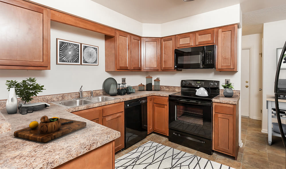 Modern kitchen at CenterPointe Apartments and Townhomes home