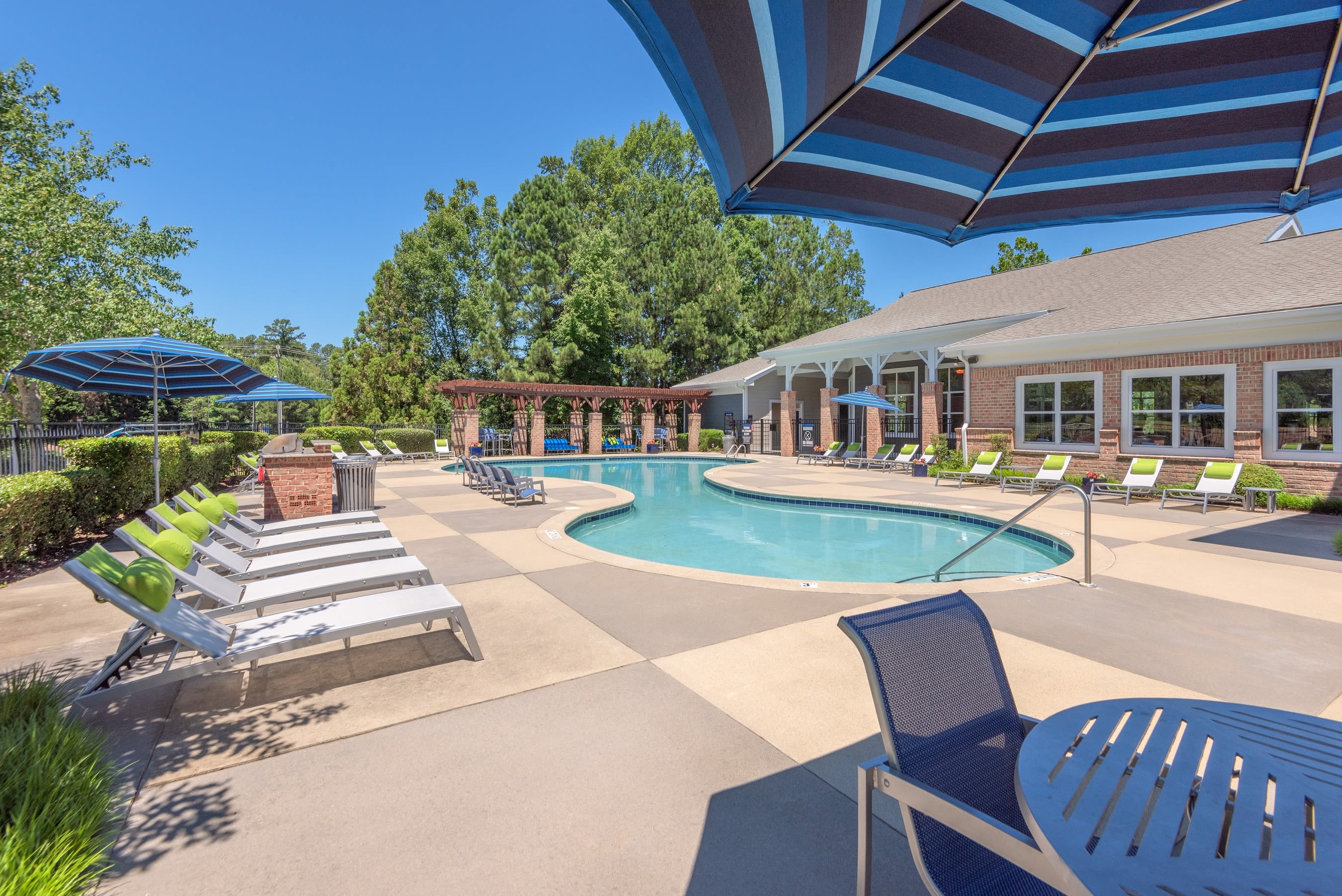 Shaded seating near the pool at 200 East in Durham, North Carolina