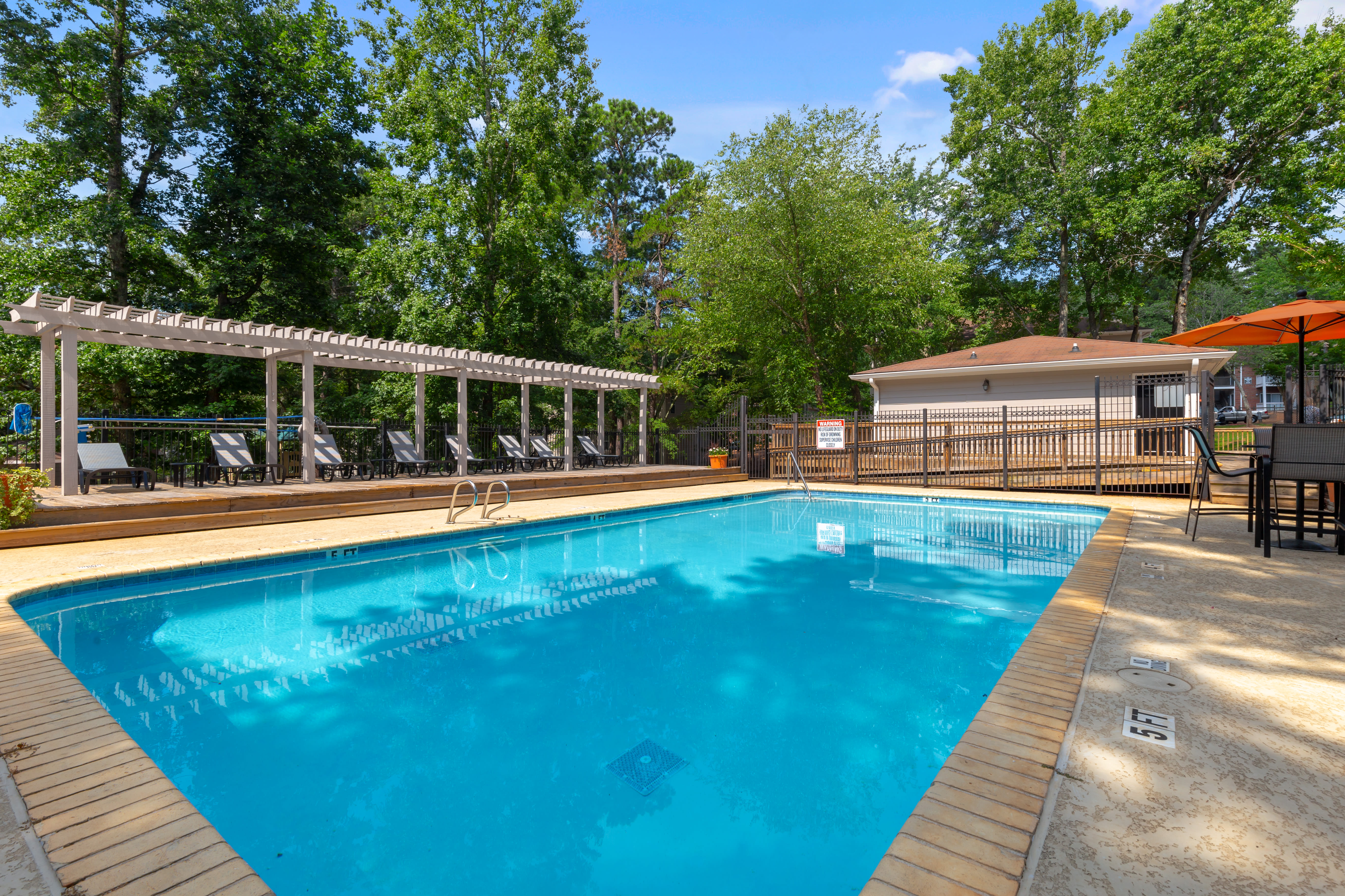 Large swimming pool at Austell Village Apartment Homes in Austell, Georgia