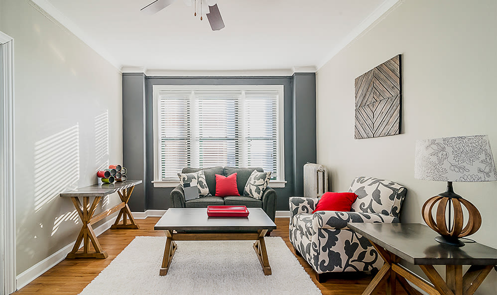Spacious living room at 7100 South Shore Apartment Homes in Chicago, Illinois