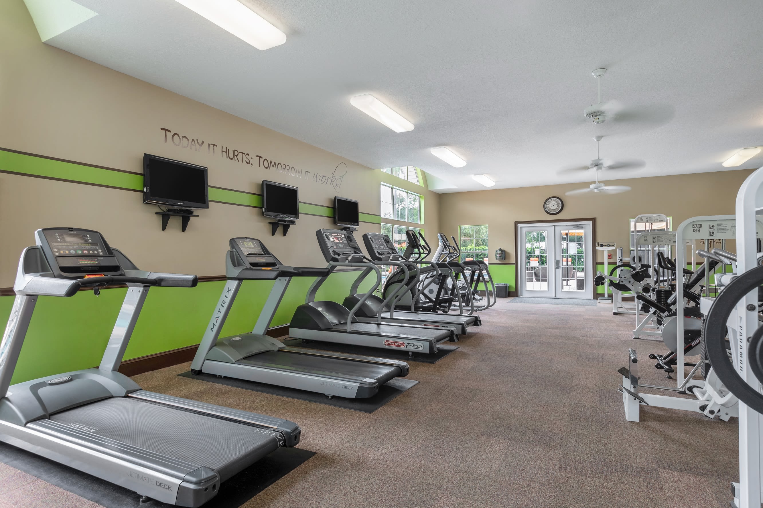 Fitness center with plenty of treadmills at Amira at Westly in Tampa, Florida
