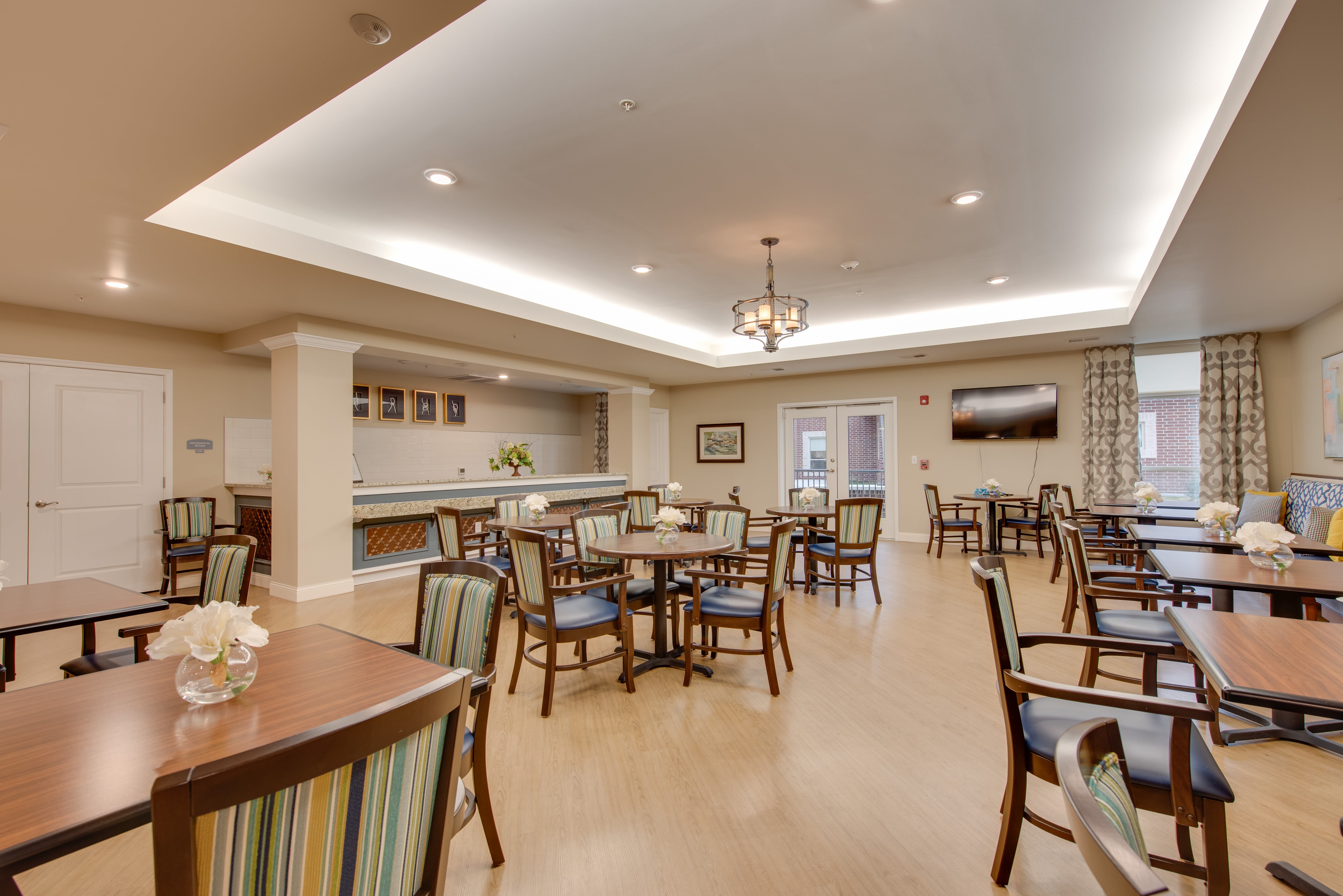 Large community meetup room with beautiful interiors at Harmony at Oakbrooke in Chesapeake, Virginia