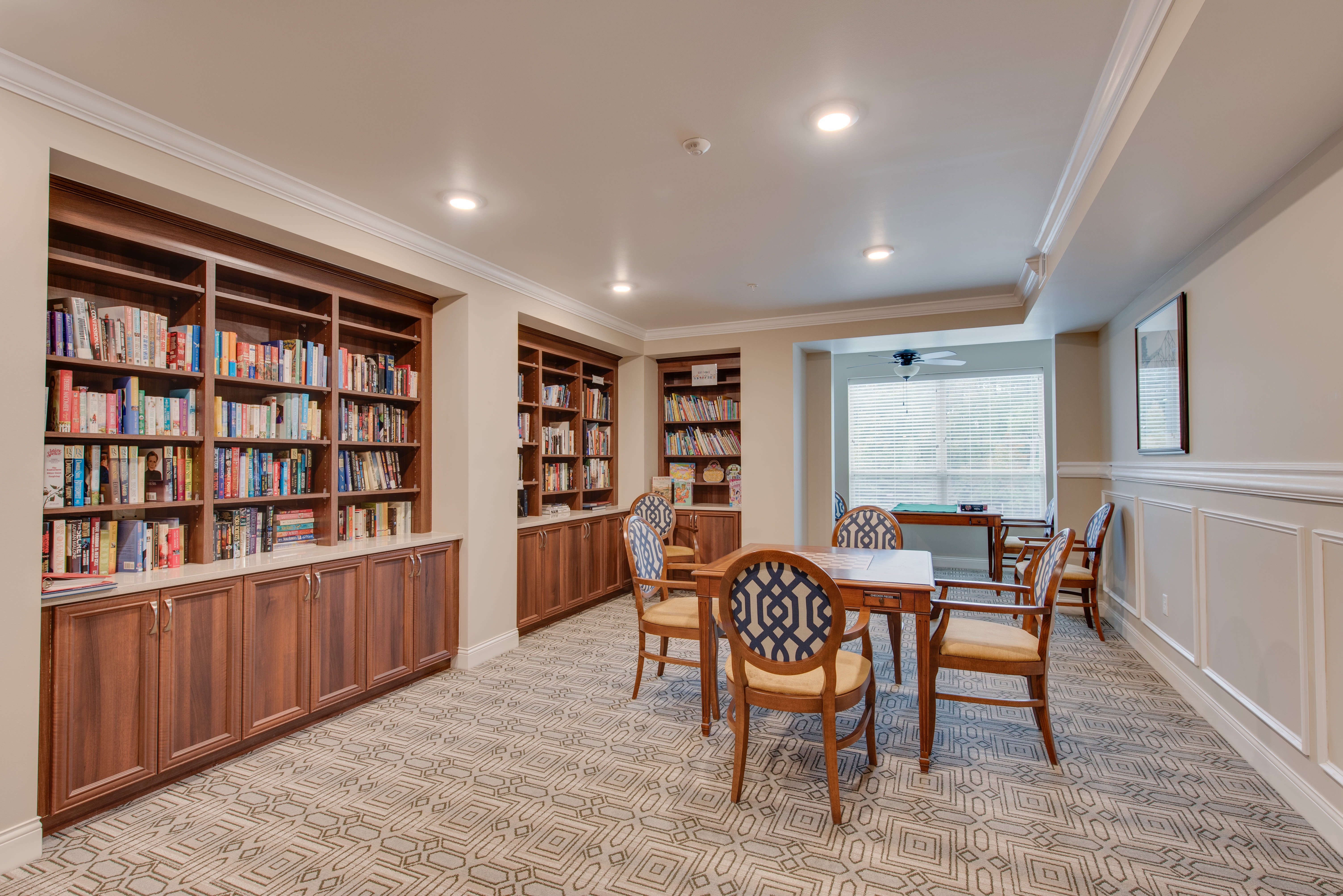 Large library with good ambience at Harmony at Oakbrooke in Chesapeake, Virginia