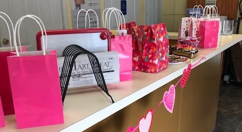 Candy and gifts decorated the counter at Lockaway Storage on Babcock Rd on Valentine's Day 2019