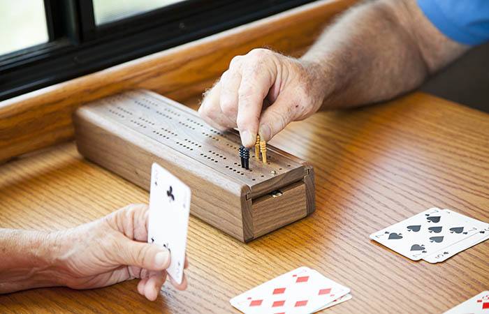 Residents playing cards at Anchor Bay at Greenwich in East Greenwich, Rhode Island.