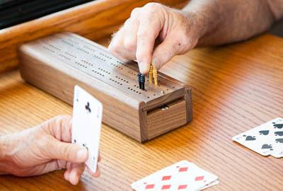Playing cribbage at Symphony at Cherry Hill in Cherry Hill, New Jersey