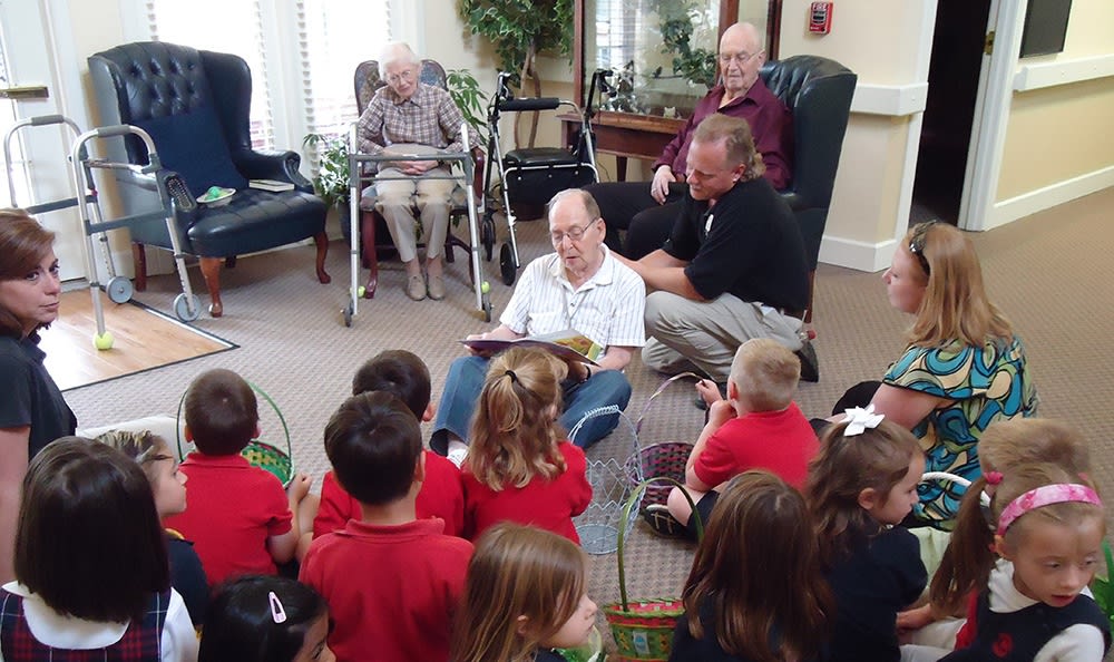 Resident reading to children Waverly Place