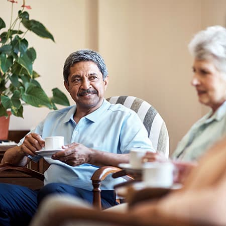 Two residents enjoying tea at The Legacy at Southpointe Drive in Greenville, South Carolina