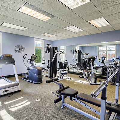 Fitness center at Knollwood Manor Apartments in Fairport, New York