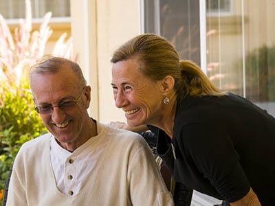 Residents laughing together at Creekside Alzheimer’s Special Care Center in Pearland, Texas