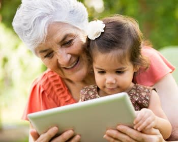 woman reading to child at The Phoenix at Greer in Greer, South Carolina
