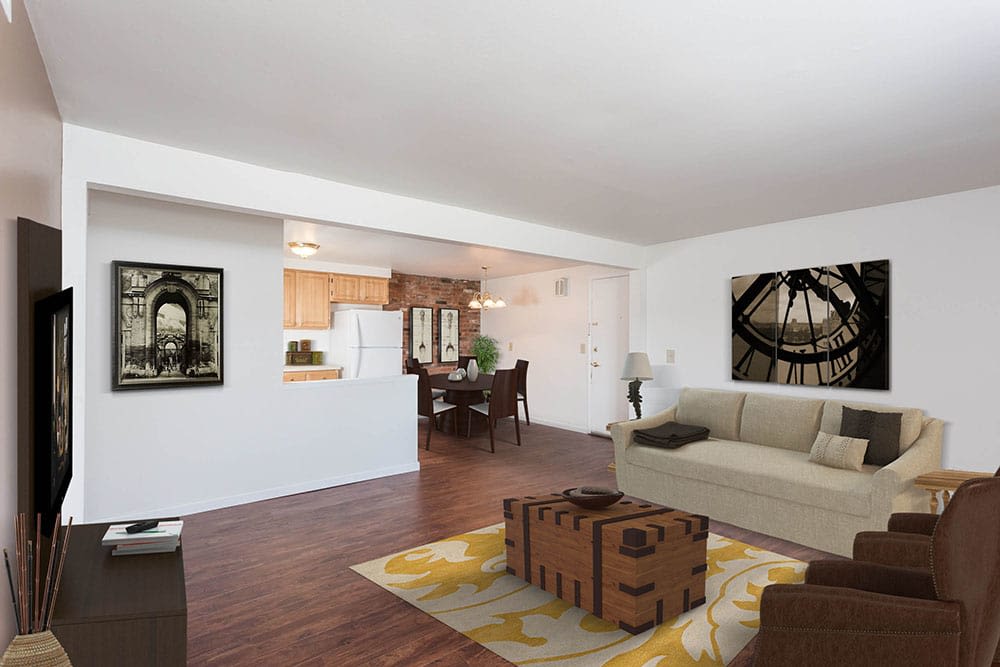 Living room with wood style flooring at Idylwood Resort Apartments in Cheektowaga, New York