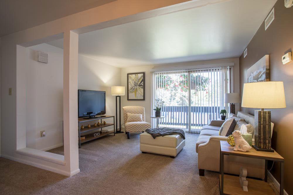Enjoy a cozy living room at Idylwood Resort Apartments in Cheektowaga, New York
