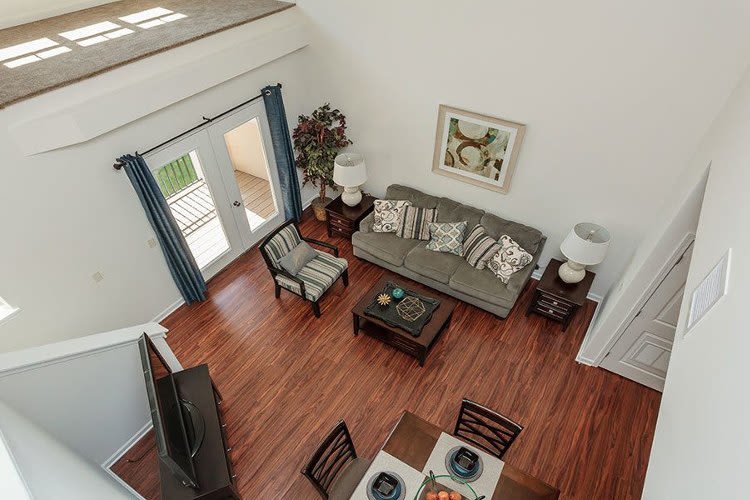 Living room and dining room view at Gateway Landing on the Canal in Rochester, New York