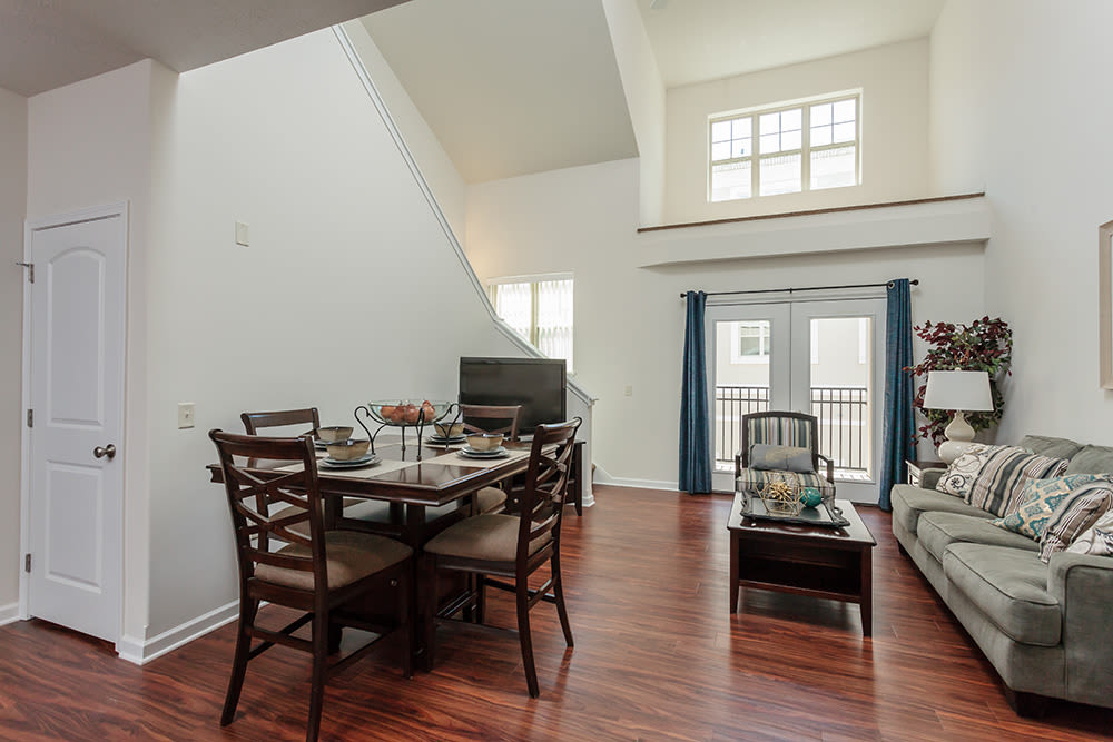 Dining room and spacious living room at Gateway Landing on the Canal home in Rochester, New York