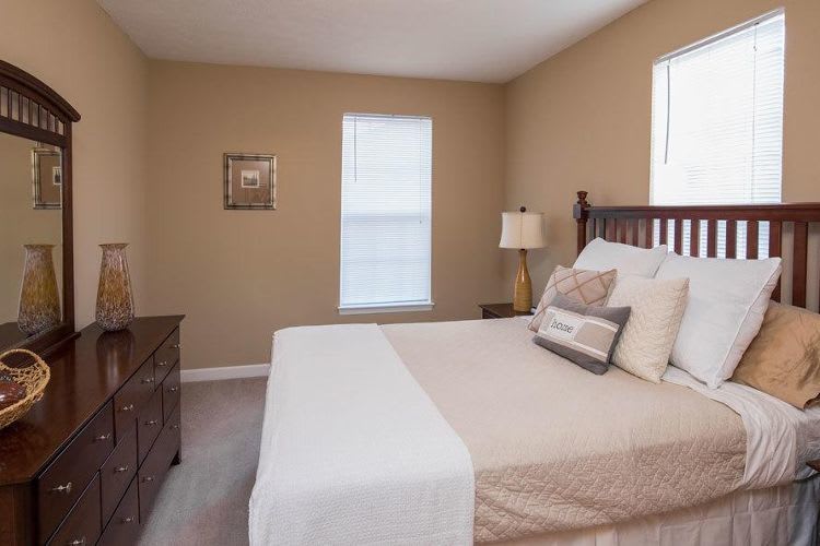 Well decorated bedroom at Main Street Apartments in Huntsville, Alabama