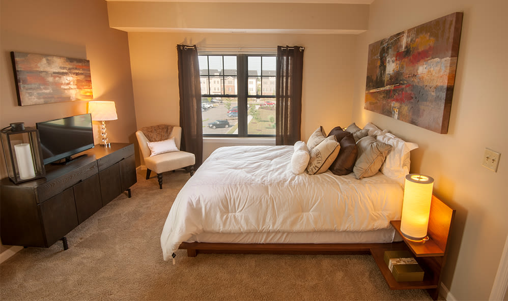 Modern bedroom at Rochester Village Apartments at Park Place in Cranberry Township, Pennsylvania