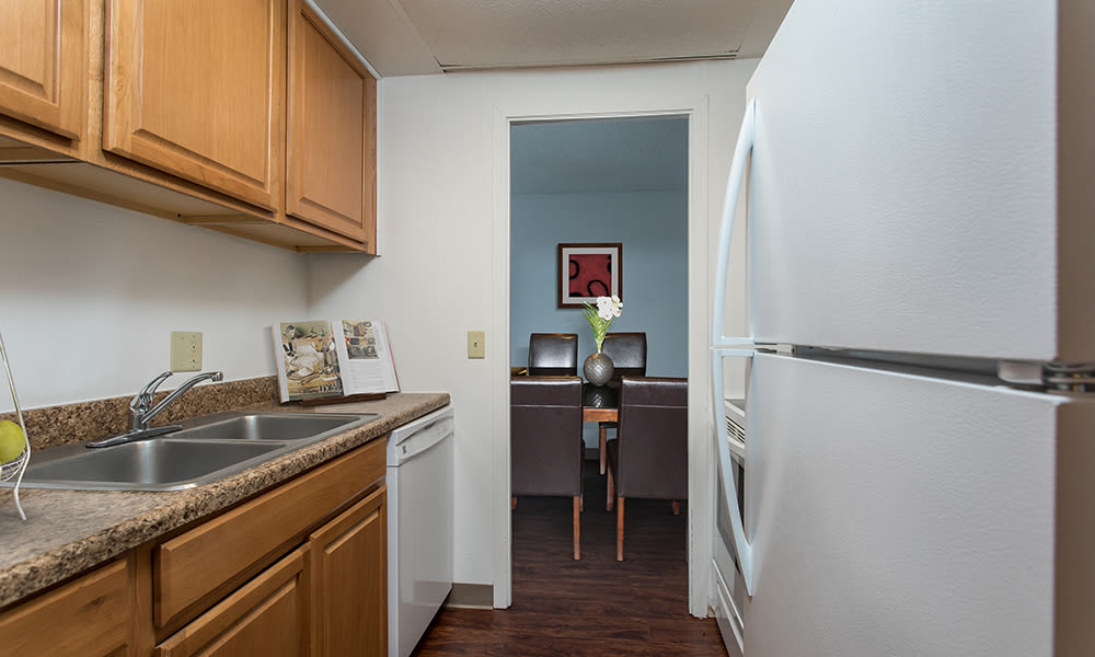 Bright, fully-equipped kitchen at Park Guilderland Apartments in Guilderland Center, New York