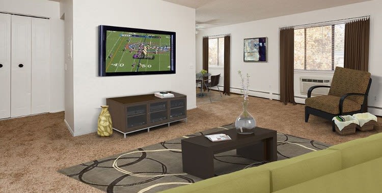 Enjoy a cozy living room at Parkway Manor Apartments in Irondequoit, New York
