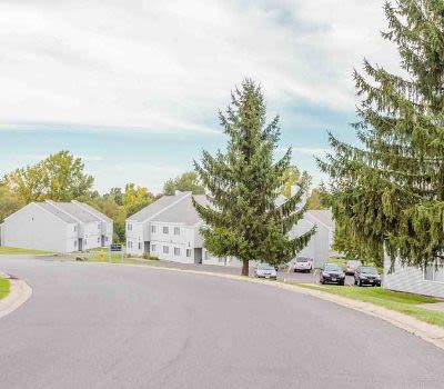 Exterior view of The Meadows Apartments community located in Syracuse, New York