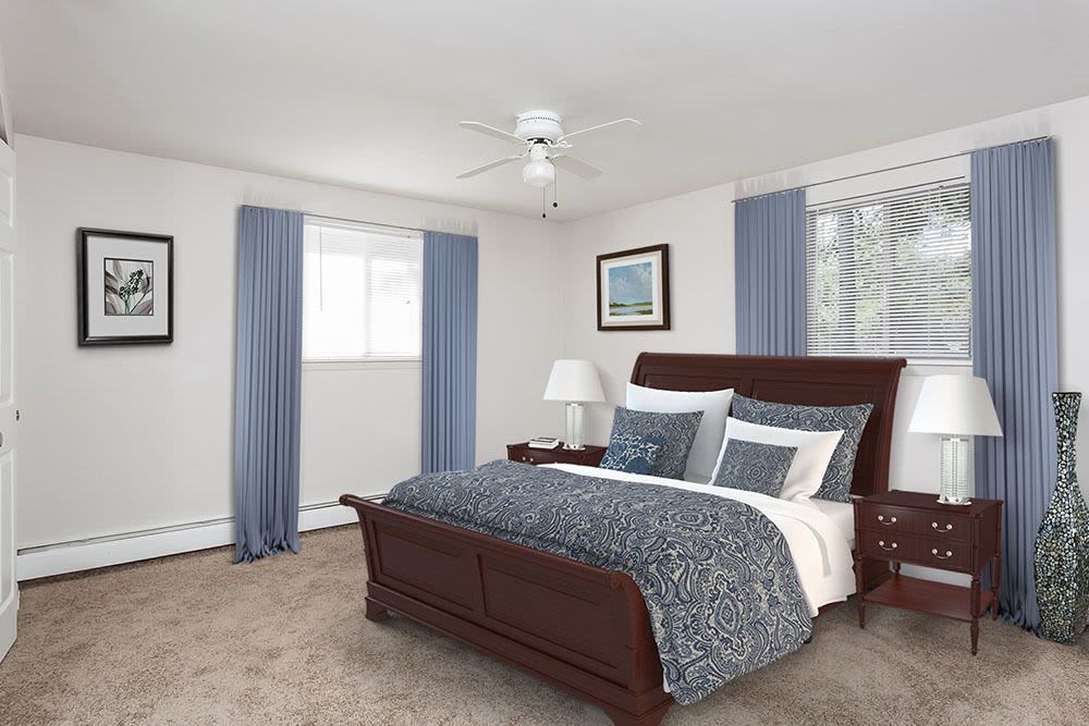 Well decorated bedroom at Long Pond Gardens Senior Apartments in Rochester, New York