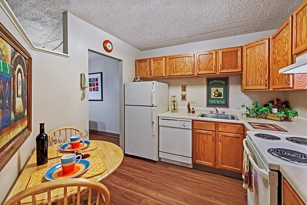 Upgraded eat-in kitchen at Maiden Bridge & Canongate Apartments in Pittsburgh, Pennsylvania