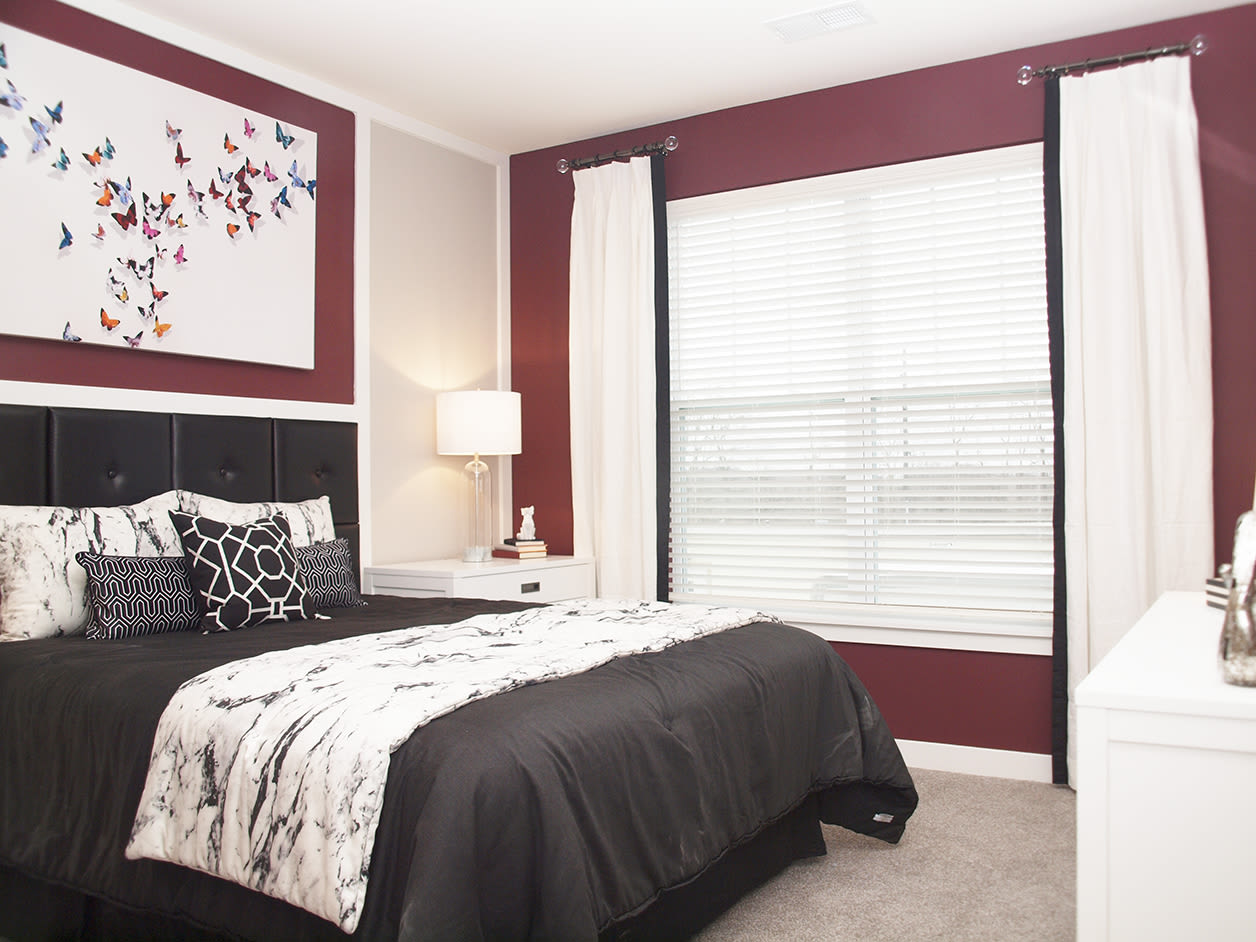 Well lit bedroom at Allure Apartments in Centerville, Ohio