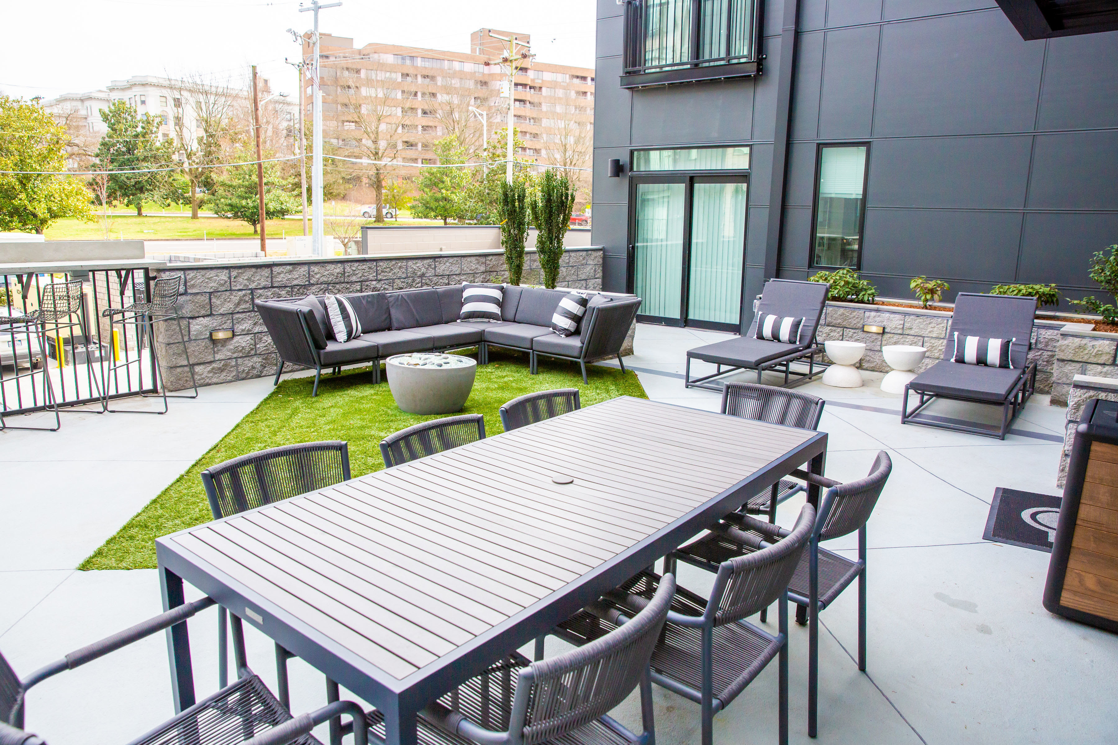 Patio and community fire pit at Belcourt Park in Nashville, Tennessee