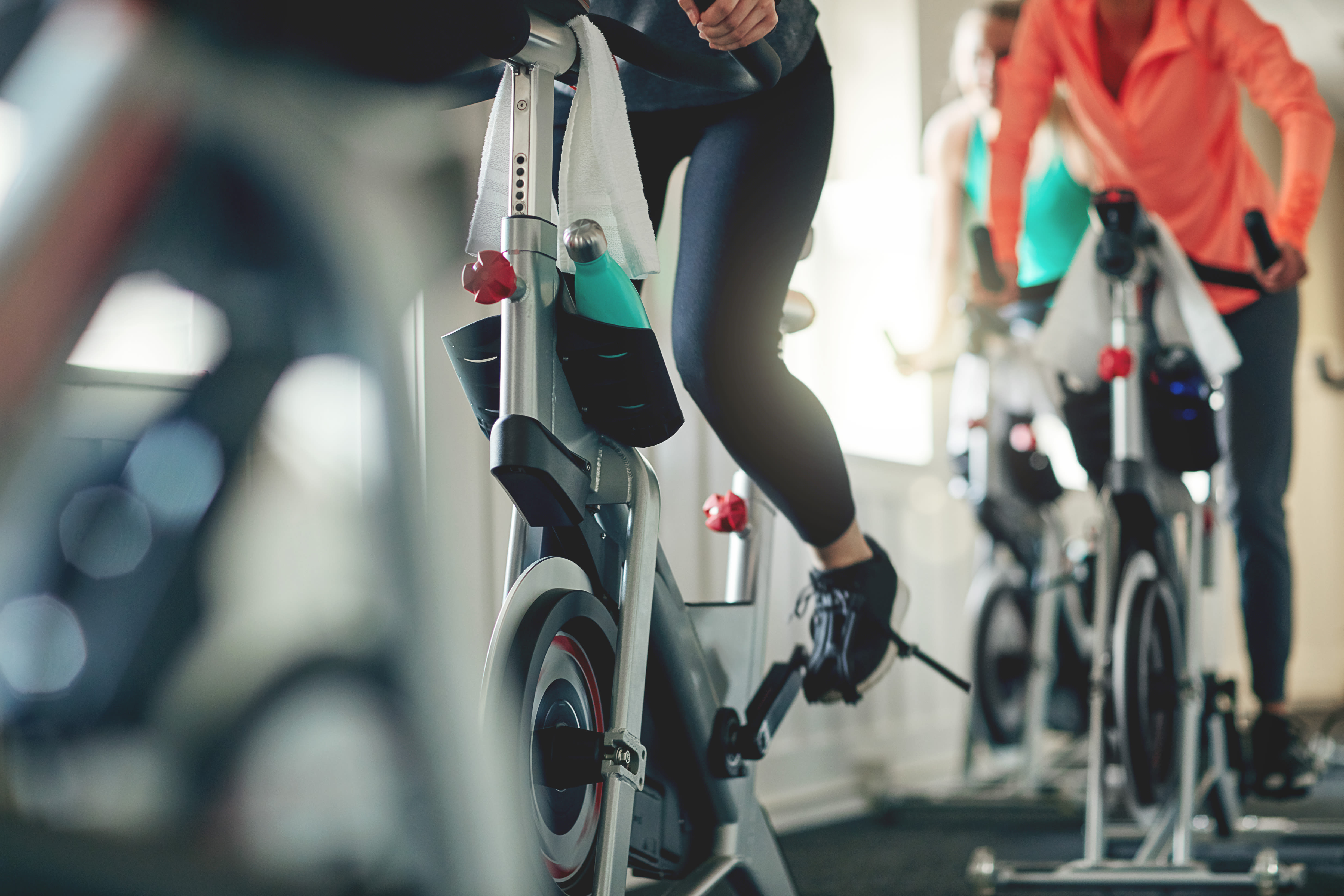 Indoor cycling in the fitness center at One90 Main in Rowlett, Texas