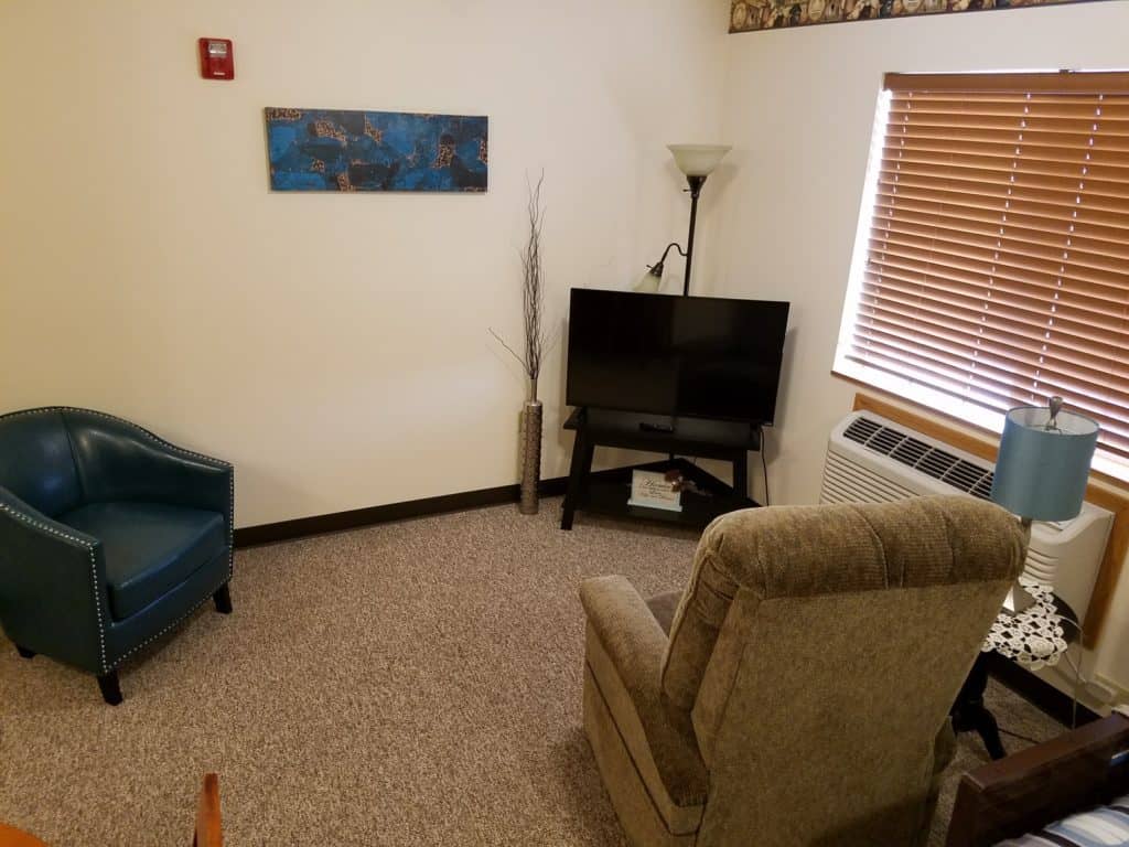 Seating area in respite care apartment at Manning Senior Living in Manning, Iowa. 