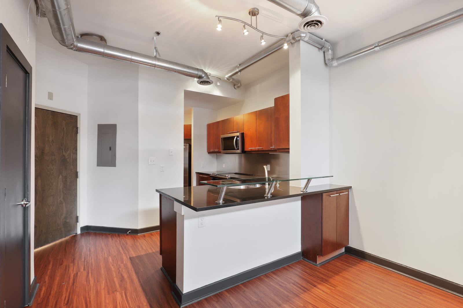 Kitchen with breakfast bar at 17th Street Lofts in Atlanta