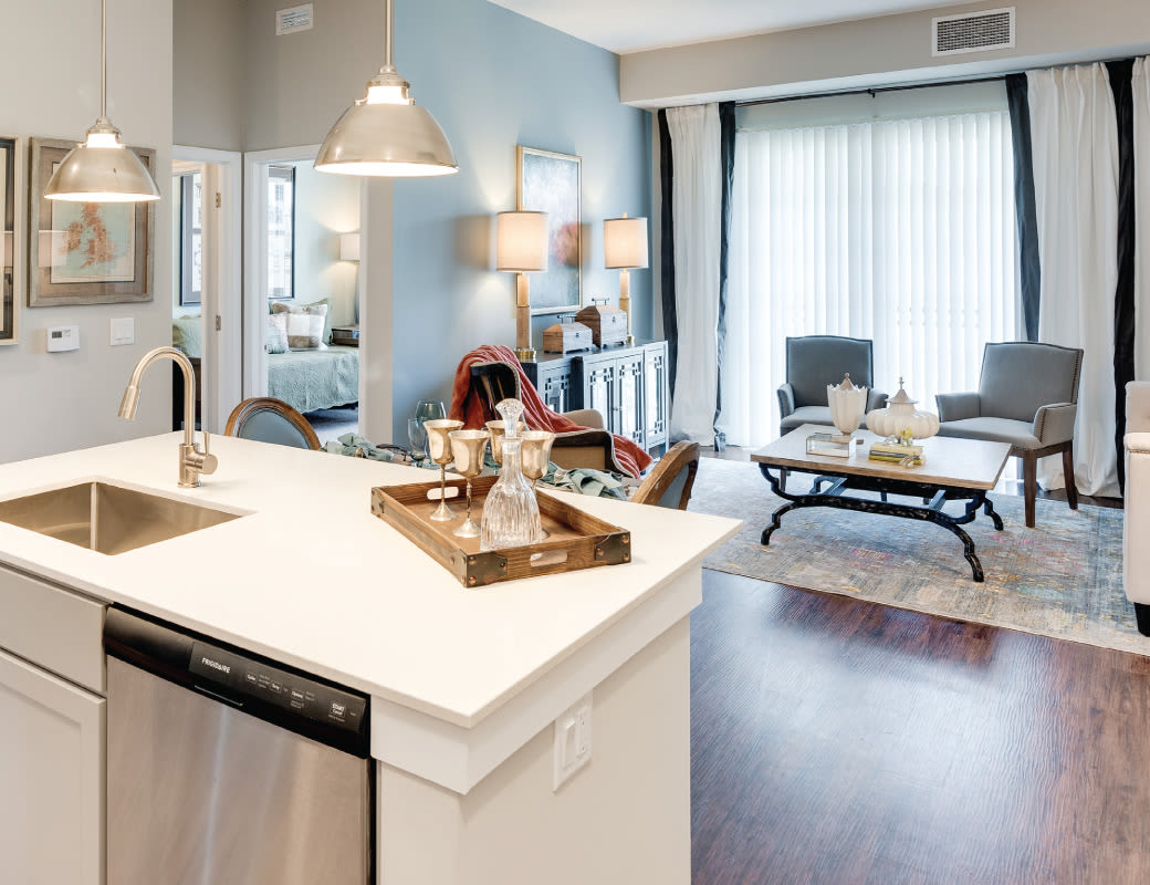 Open dining and living area at Avenida Naperville Apartments
