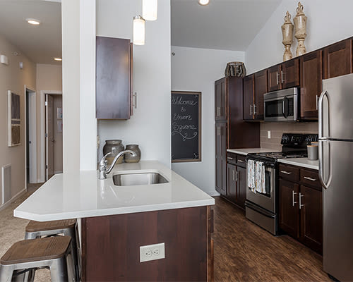Modern kitchen at Union Square Apartments in North Chili, New York
