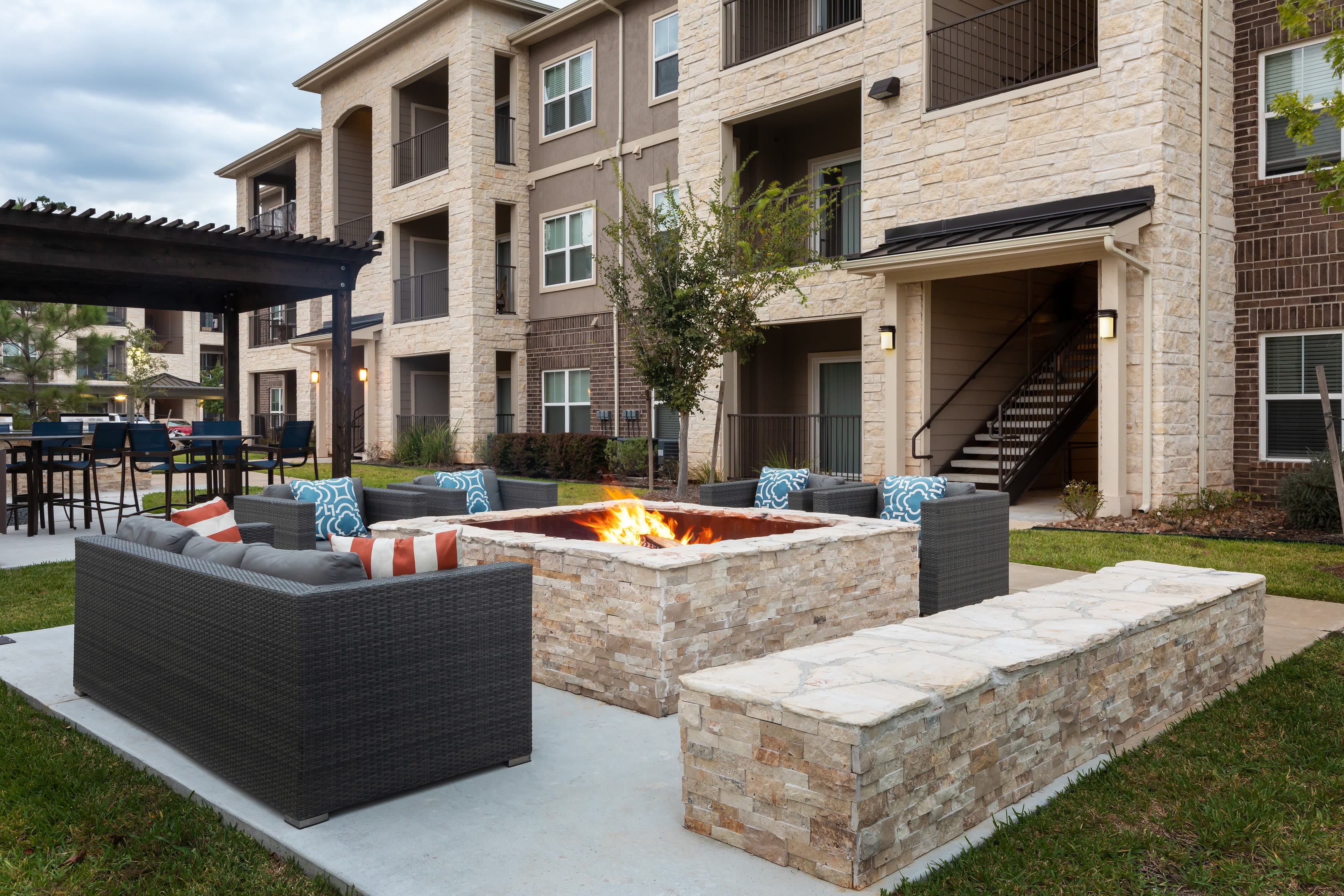 Outdoor grills and fire pit at Hilltops in Conroe, Texas