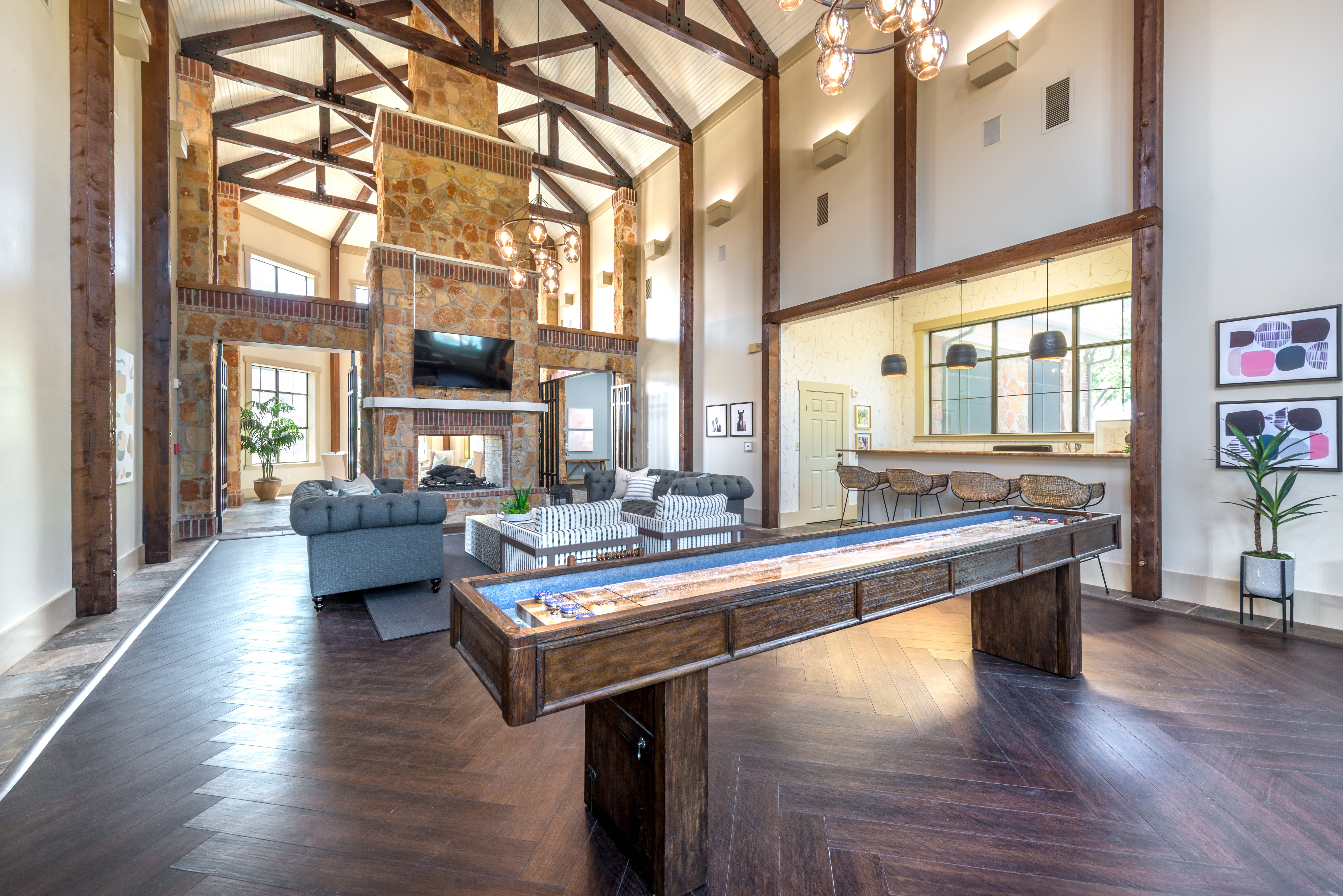 Clubhouse gaming and seating area at Olympus Team Ranch in Benbrook, Texas