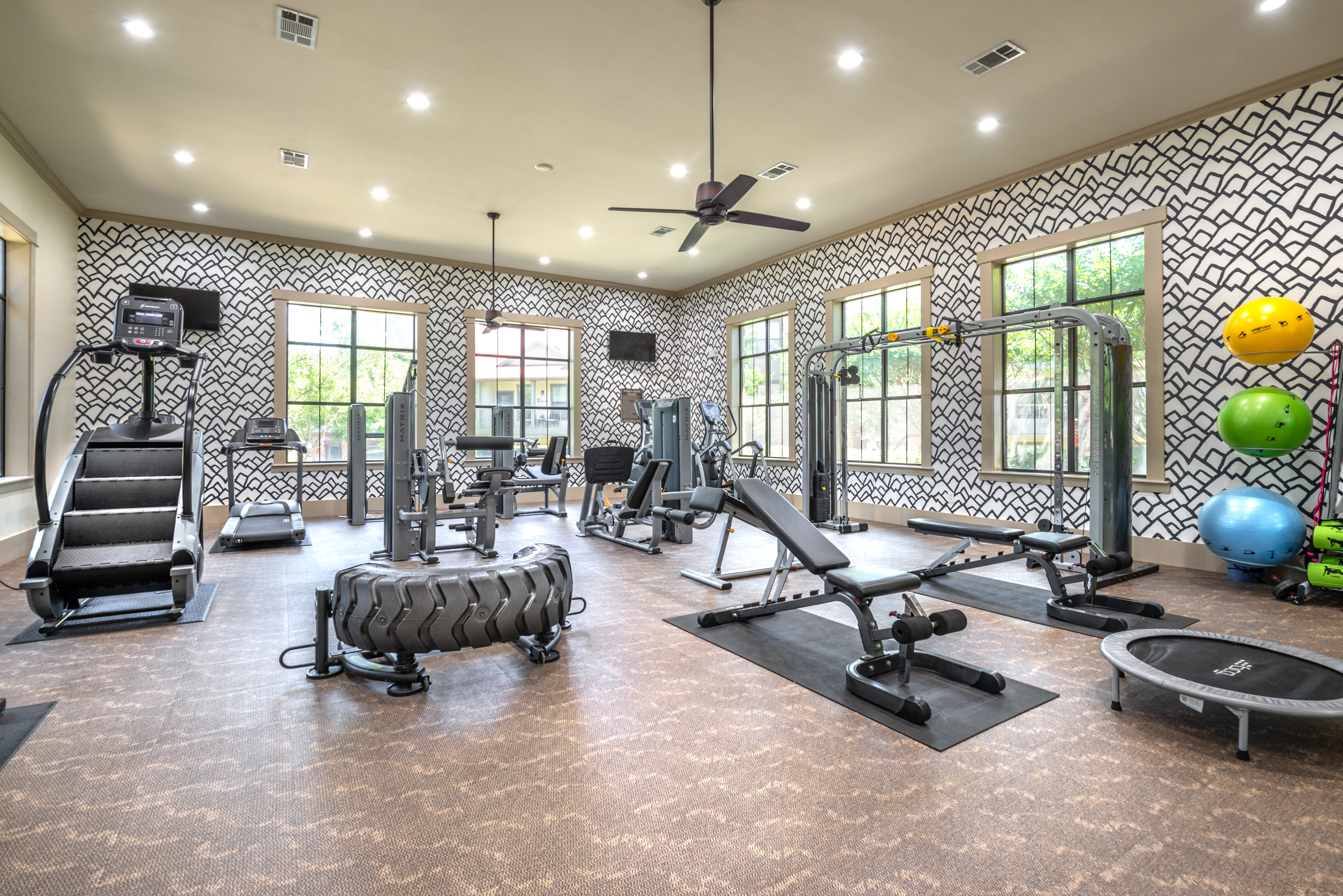 Well-equipped onsite fitness center at Olympus Team Ranch in Benbrook, Texas