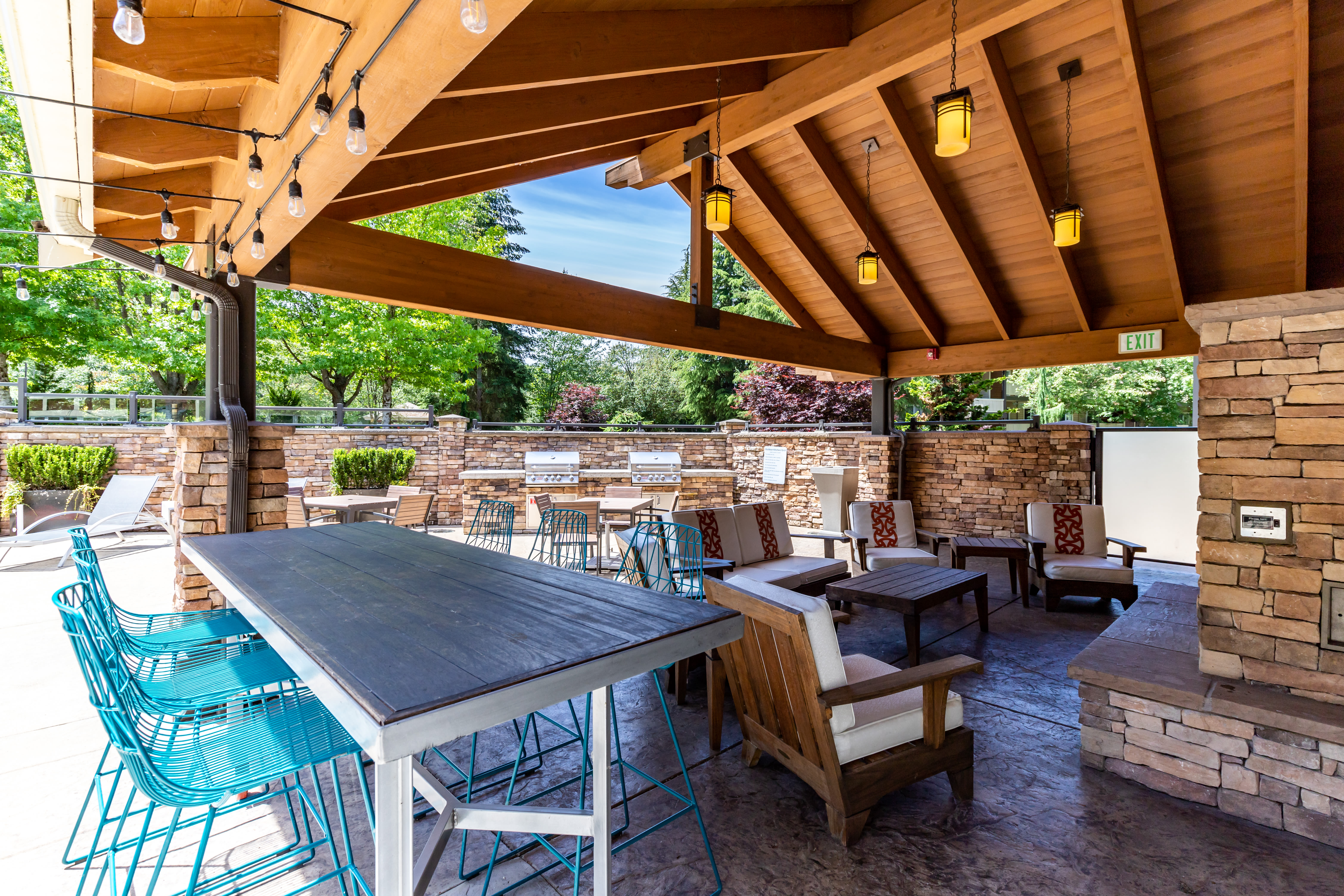 Welcoming poolside patio at The Preserve at Forbes Creek in Kirkland, Washington