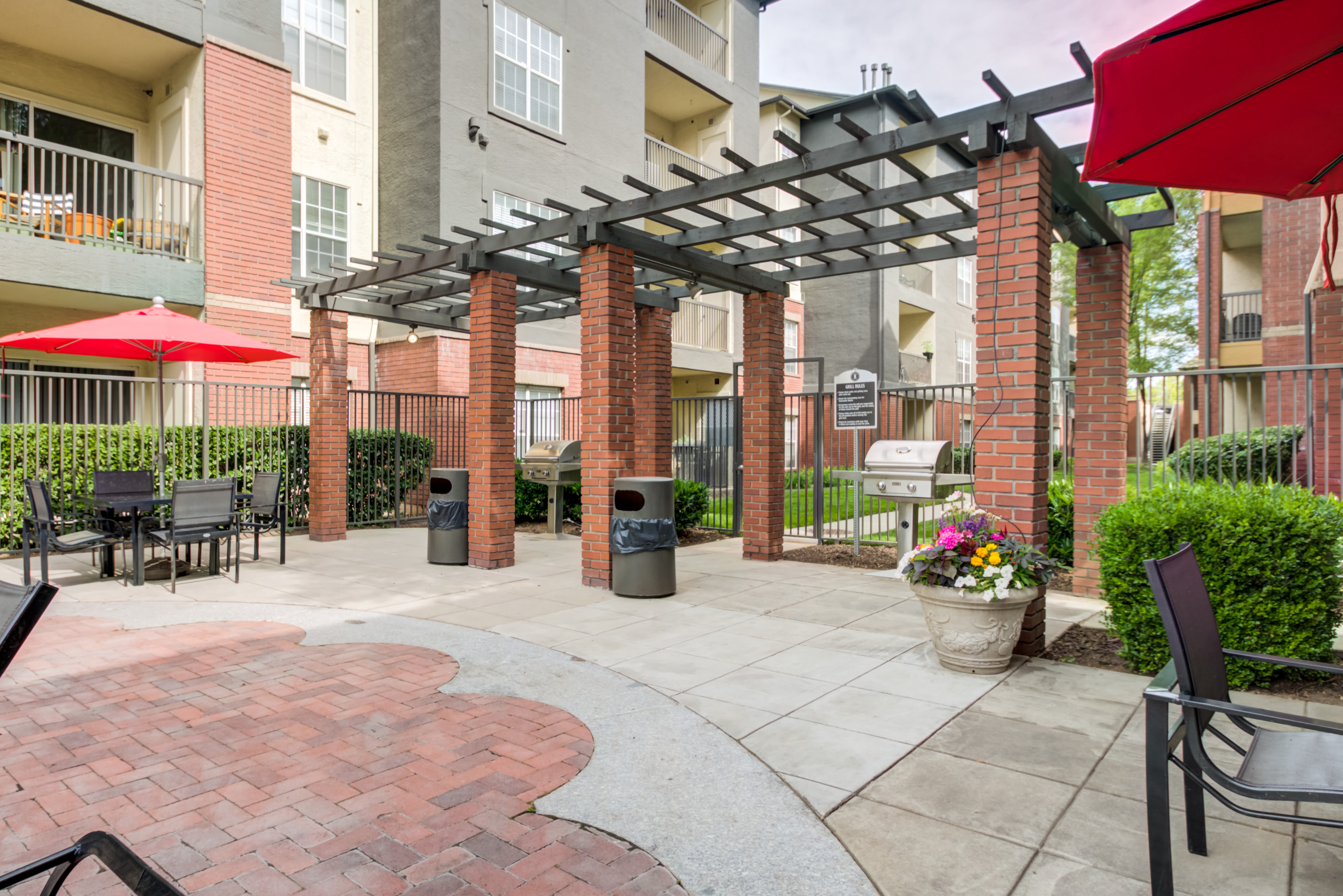  Outdoor seating with shade pergola at Irving Schoolhouse Apartments in Salt Lake City, Utah
