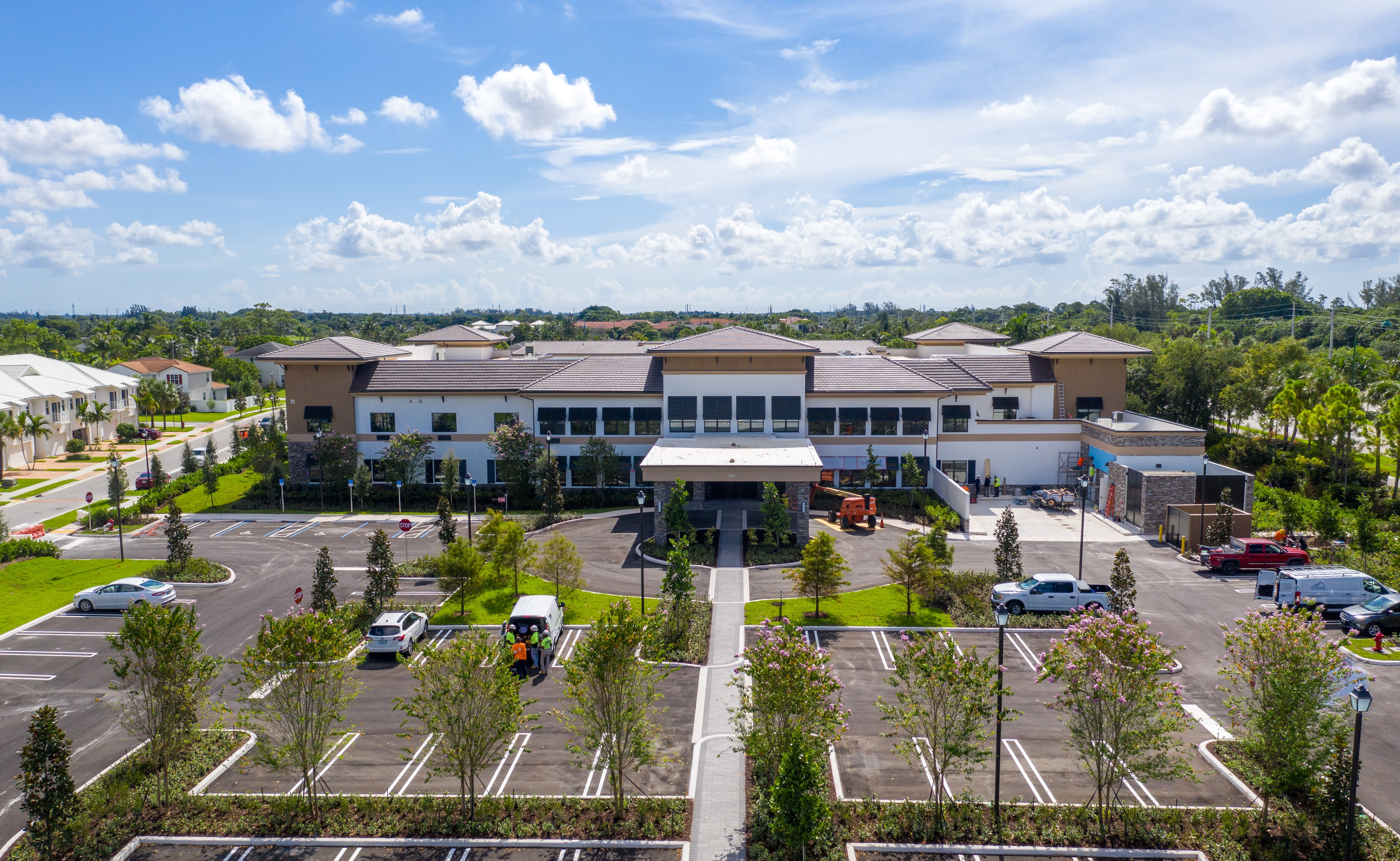 Exterior photo of the new community at Inspired Living Royal Palm Beach in Royal Palm Beach, Florida.