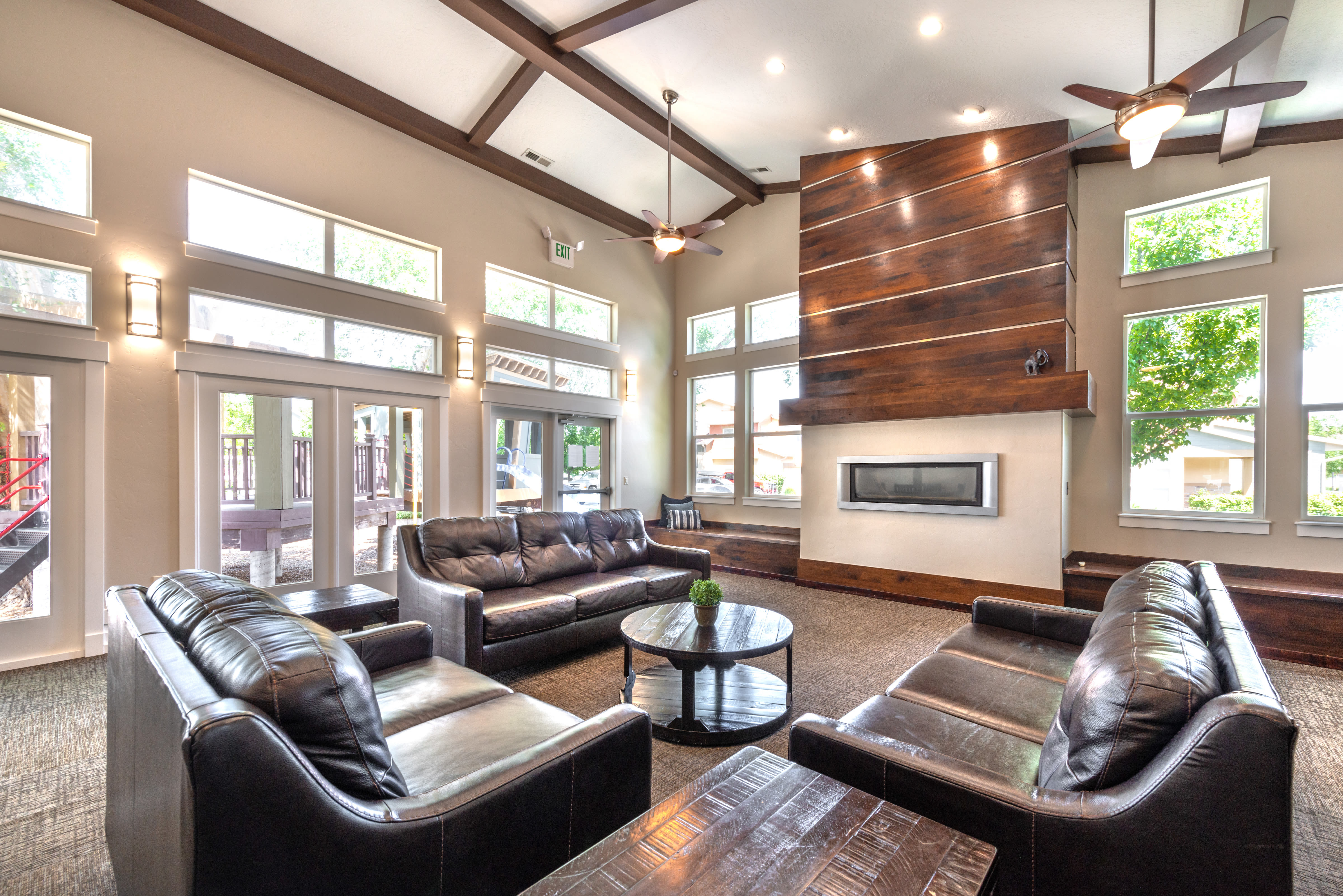 Spacious community clubhouse with vaulted ceiling at Olympus at the District in South Jordan, Utah