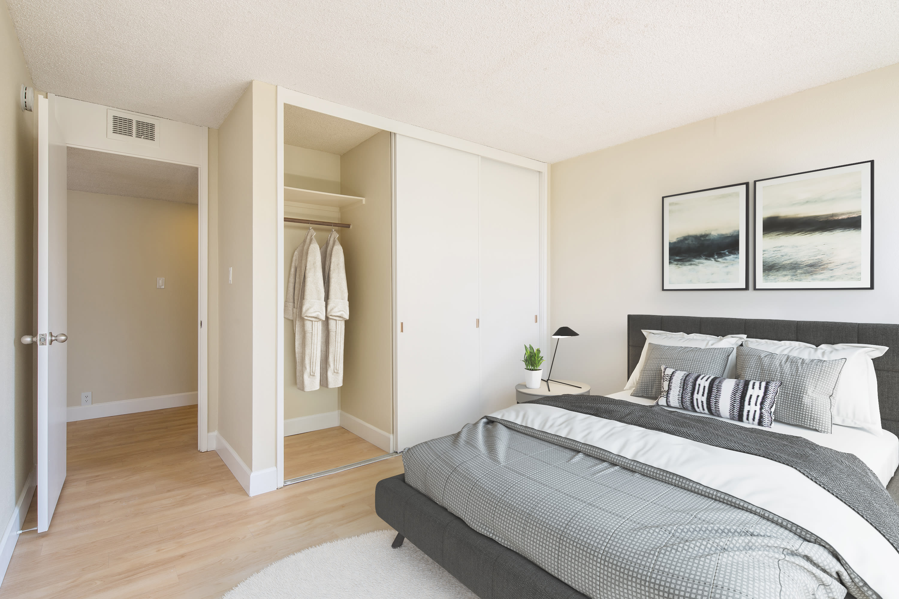 Bedroom and closet at Skyline Terrace Apartments in Burlingame, California