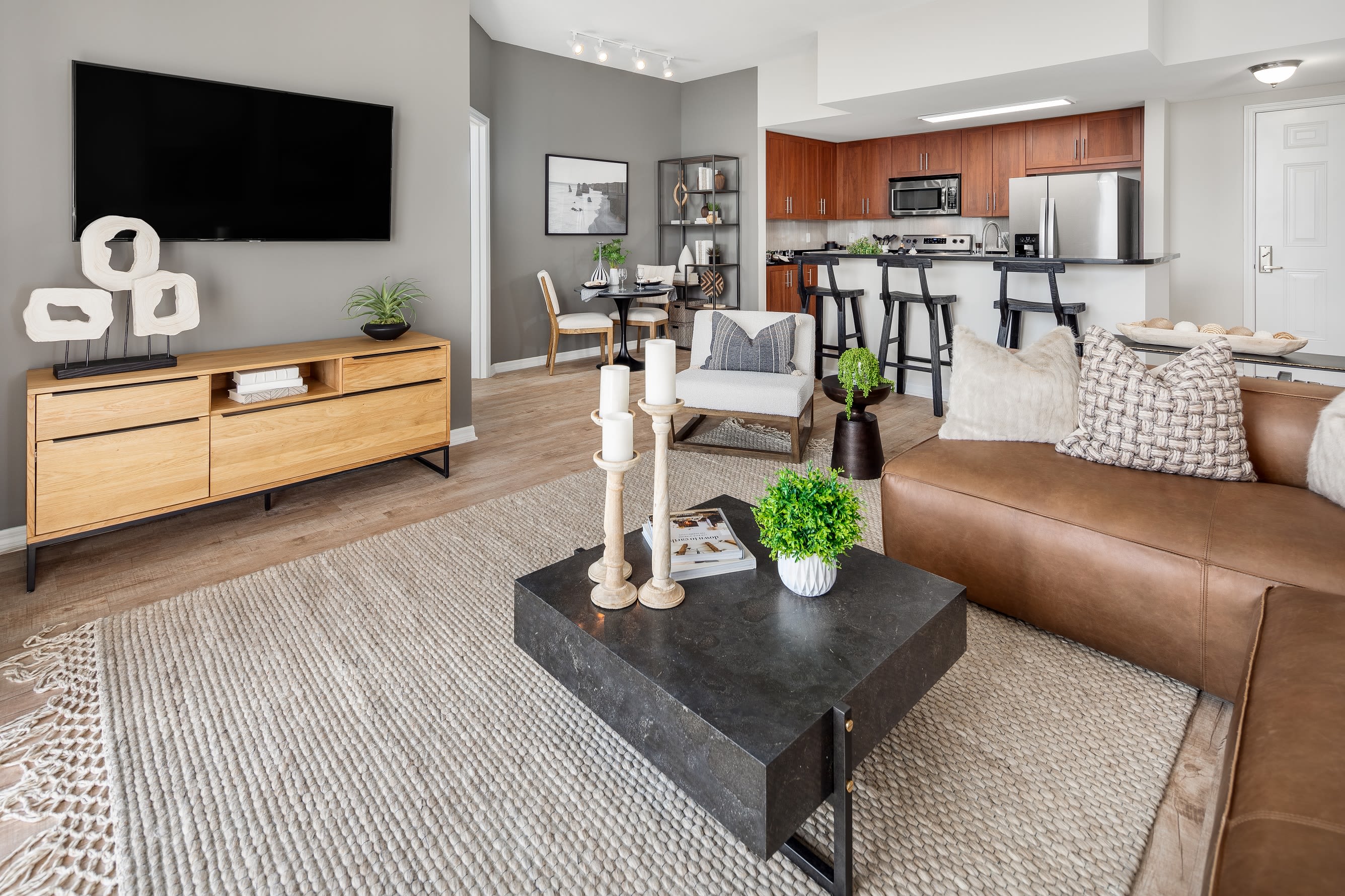 Spacious main bedroom with a large window at Midtown 24 in Plantation, Florida