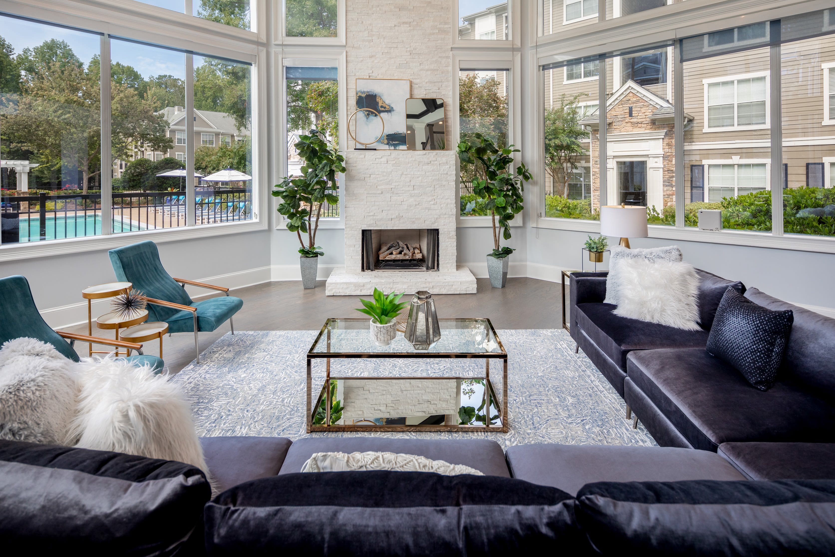 Open-concept layout with carpeted floors at Cavalier @ 100 in Lithonia, Georgia