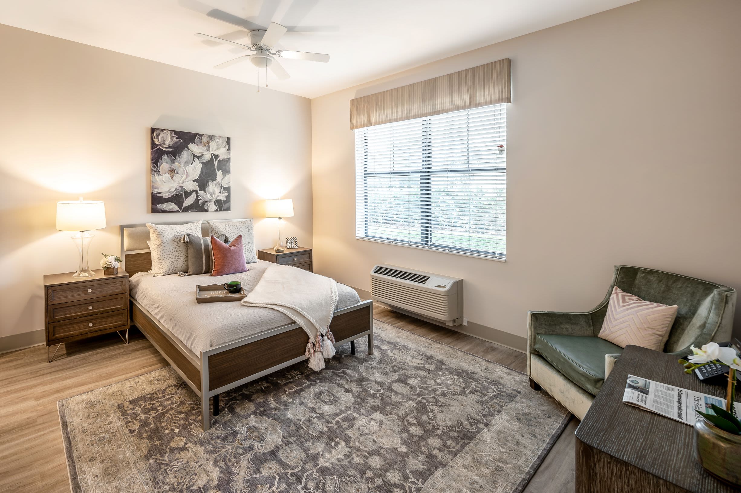 Large resident bedroom at Inspired Living Royal Palm Beach in Royal Palm Beach, Florida.