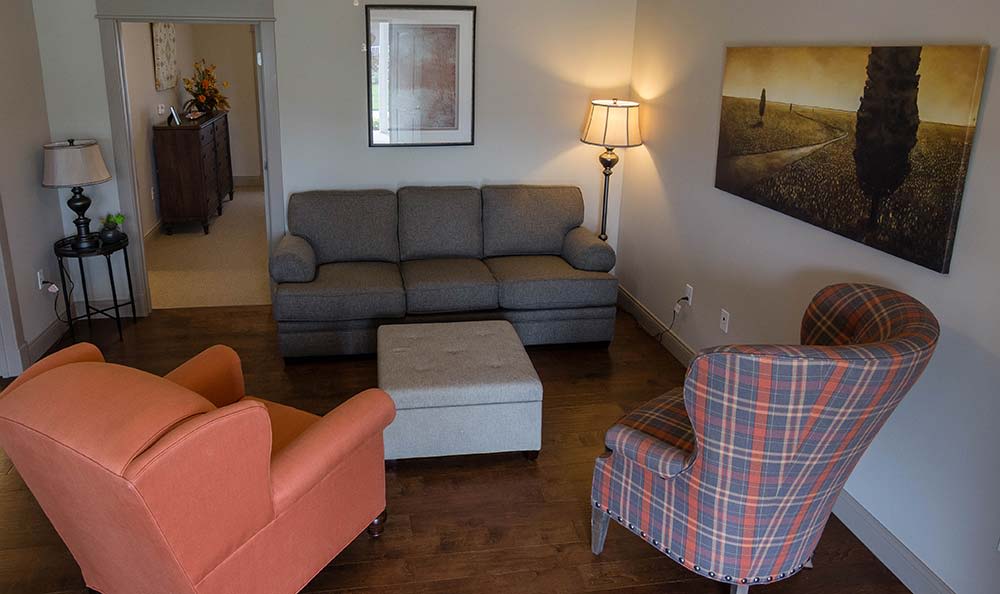 Comfortable Living room included in our Cottage style floor plans at Field Pointe Assisted Living in Saint Joseph, Missouri